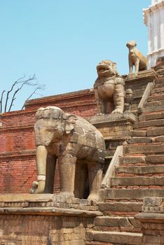 Old buddhistic statues on Bhaktapur Square. Kathmandu, Nepal