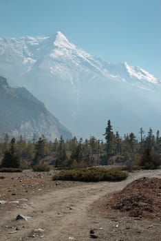 Tibetan road in Himalayan mountain with blue sky.