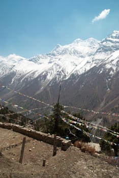 Buddhist praying flags in nepal high mountains