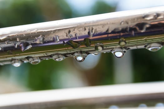 Droplet on stainless bar after the rain.