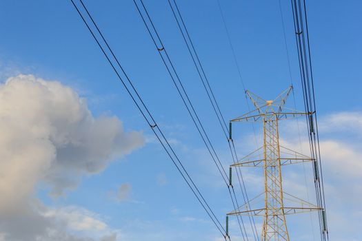 Electricity post in the evening with blue sky.