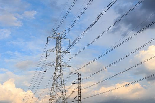 Electricity post in the evening with blue sky.