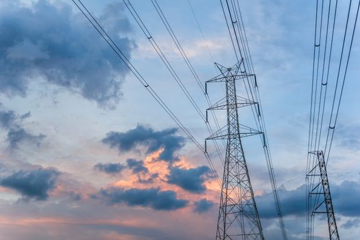 Electricity post in the evening at sunset.