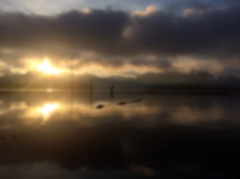 Sunrise reflection on the water.