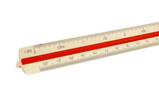 A ruler placed on the desk. Focus in the front.