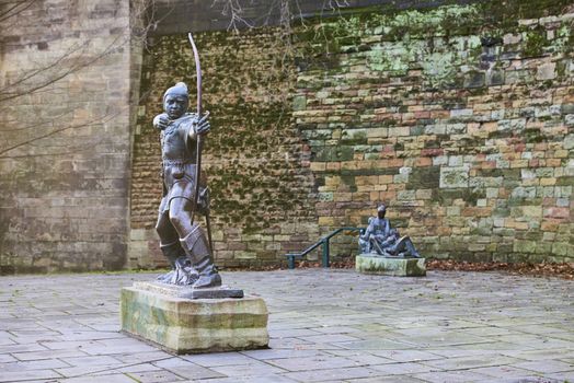NOTTINGHAM, UK - DECEMBER 04: Statue of Robin Hood outside Nottingham castle. The statue, created by James Woodford, was unveiled in 1952. December 04, 2015 in Nottingham.