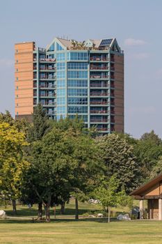 Coeur d'Alene, Idaho, USA-July 9, 2015: A view of a large apartment building and offices in Idaho from LakeCoeur d'Alene during sunset.