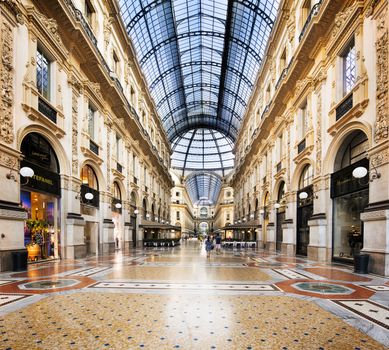 MILAN, ITALY - AUGUST 29, 2015: Luxury Store in Galleria Vittorio Emanuele II shopping mall in Milan, with tasted Italian restaurants