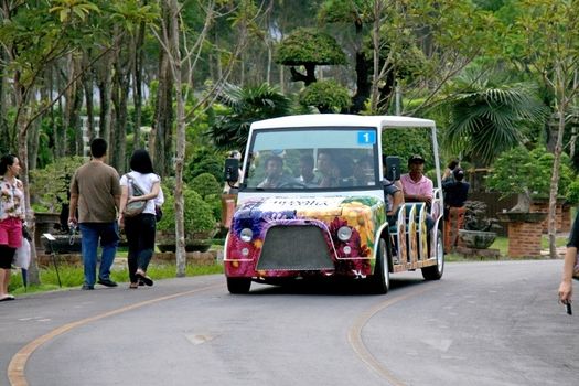 CHIANGMAI, THAILAND - MARCH 13 2012: Shuttle bus service in area of Royal Flora Ratchapruek Park.