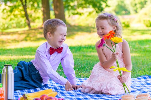 gentleman and a happy little lady on a date at the park