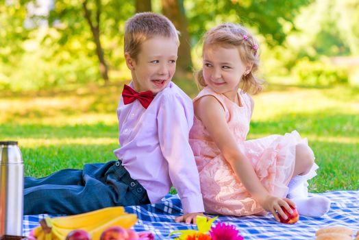 Portrait of children on a picnic in the park