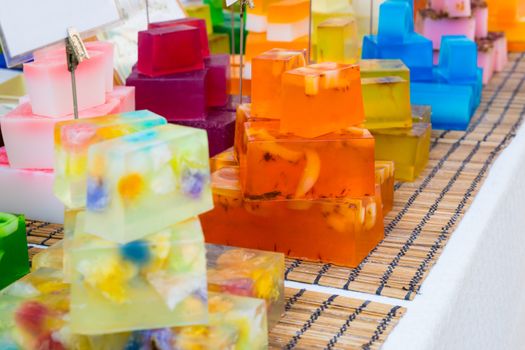 Colorful hand made soap bars on a market stall