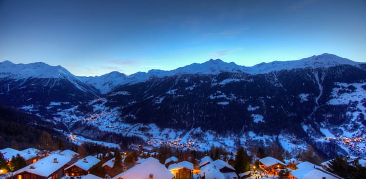 Panoramic view of the Val d'Anniviers at dusk, view from the village of St Luc. Canton of Valais, Switzerland.