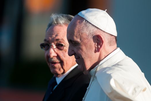 CUBA, Havana: Pope Francis walks side-by-side with Cuban President Raul Castro (L) shortly after his arrival at Jose Marti airport in Havana, Cuba on February 12, 2016. The pope's arrival would be followed immediately by a historic meeting with Russian Orthodox Patriarch Kirill.