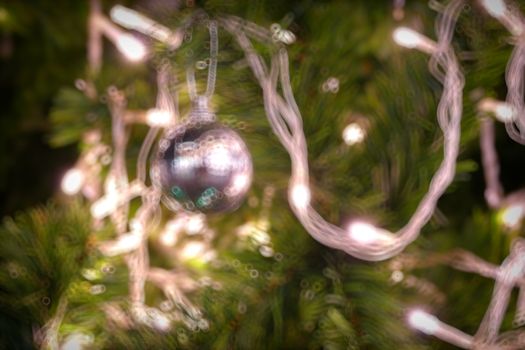 Gold Christmas background of de-focused lights with decorated tree, Christmas background 