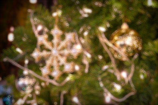 Gold Christmas background of de-focused lights with decorated tree, Christmas background 