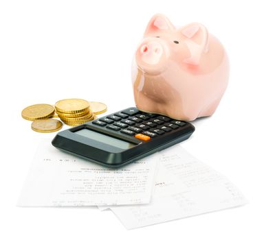 Piggy bank with calculator and bills on isolated white background