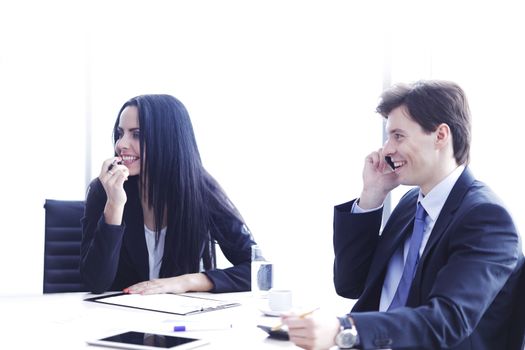 Business people discussing financial reports during a meeting