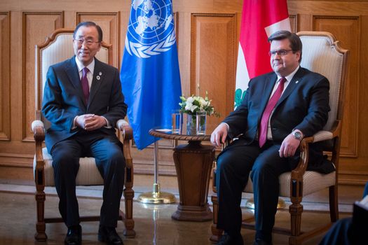 CANADA, Montreal: UN Secretary-General Ban Ki-moon (L) poses with Montreal mayor Denis Coderre, in Montreal, on February 12, 2016. Ban welcomed a plan to cease hostilities in war-wracked Syria that would allow humanitarian aid to reach tens of thousands clinging to life.