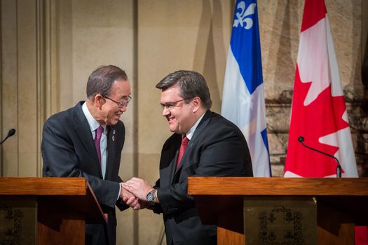 CANADA, Montréal: UN Secretary General Ban Ki-Moon (L) shakes hands with mayor of Montreal Denis Coderre (R) during a visit in Montreal on February 12, 2016.
