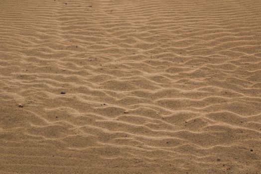 Design created by the nature. Sand creating various patterns. Atlantic ocean coast, Morocco.