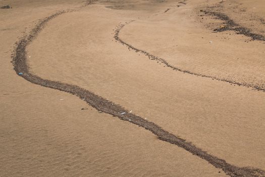 Design created by the nature. Sand creating various patterns. Atlantic ocean coast, Morocco.