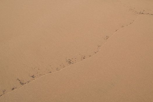 Design created by the nature. Sand creating various patterns. Atlantic ocean coast, Morocco.