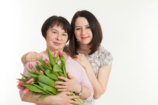 the woman presented a bouquet of flowers for mother