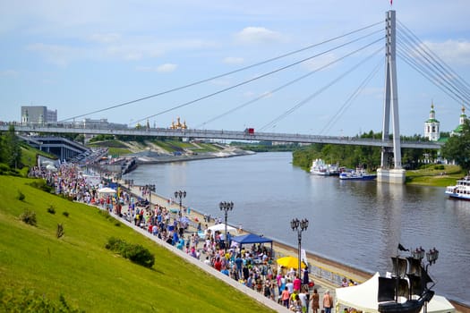 The embankment in Tyumen and the cable-stayed foot bridge. June, 2015, Tyumen, Russia