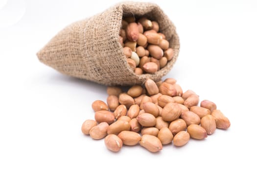 Peanut in Gunny Bag on white background