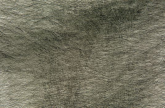 Texture of coarse ground leather with clearly visible structure. Interesting background and texture. horizontal view.
