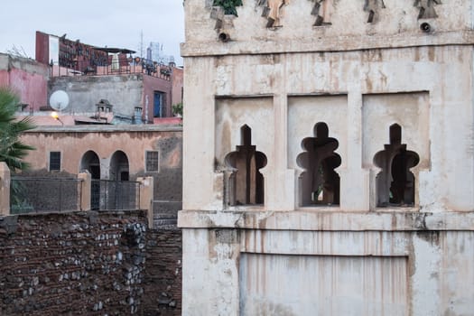 Detail of a traditional style of architecture in Marrakesh, Morocco. Old medina. In the background houses.