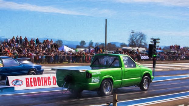 Redding, California: A small green pickup truck and a blue hot rod get the green light to start during a drag light.
Photo taken on: February 13th, 2016