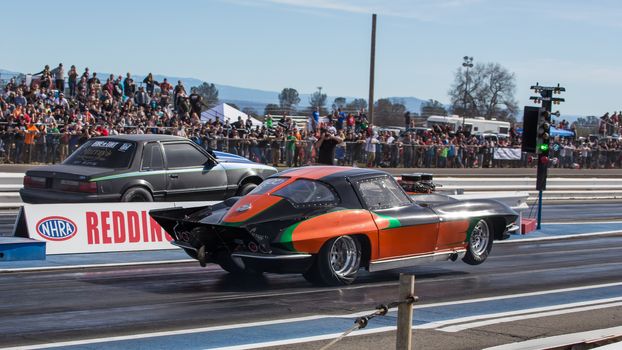 Redding, California: A modified Chevy Corvette gets to go and starts racing down the track.
Photo taken on: February 13th, 2016