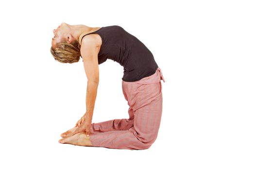 Young woman making a yoga posture on a white background