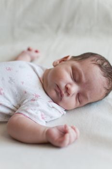 Vertical portrait of the sleeping baby