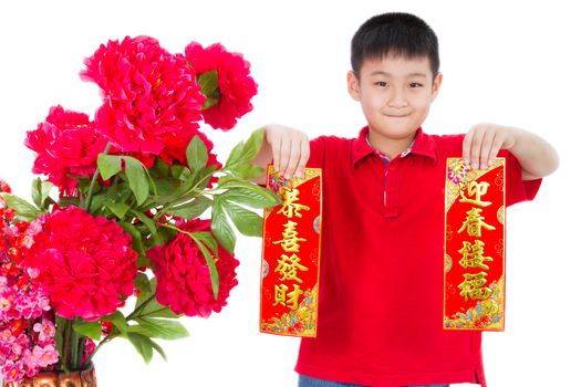 Asian Little Boy Holding Red Couplets for Chinese New Year on White Background