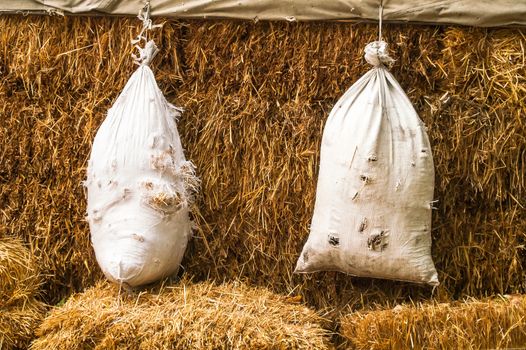 a hanging bag and straw for the shooting range and shooting