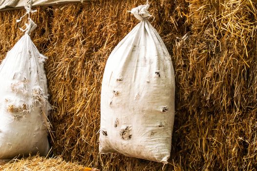 a hanging bag and straw for the shooting range and shooting