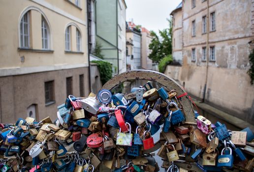 Romantic place on a small bridge in the old city of Prague, used by many couples to lock their love.