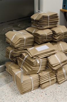 Stack of brown envelopes. Documentation filed in brown paper envelopes