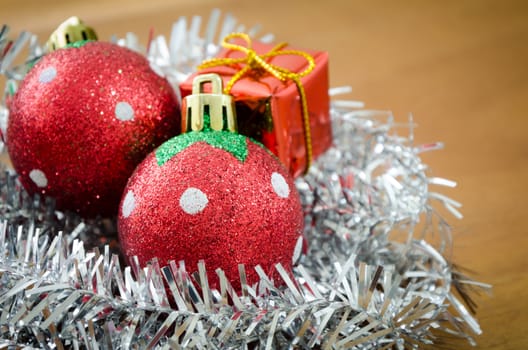 Christmas ball and Christmas decorations on wooden background