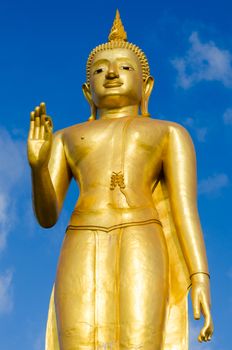 Statue standing buddha in Hatyai city, province Songkhla , Thailand