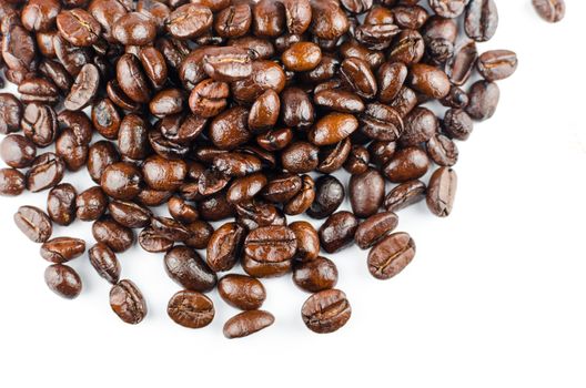 An arrangement of coffee beans on a white background