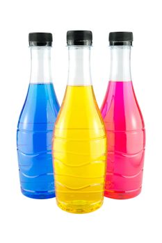 Bright colorful water in bottles on white background