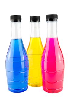 Bright colorful water in bottles on white background