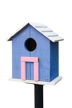 Blue birdhouse on a white background.