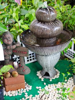 Outdoor Fountain in the Garden sunflowers