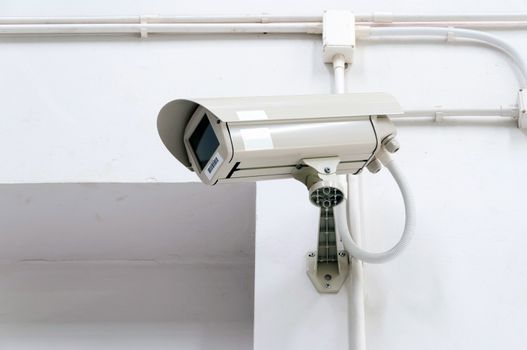 CCTV security camera mounted on the wall