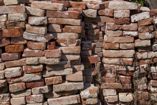 Old bricks in a perfect order, waiting for being re-used.